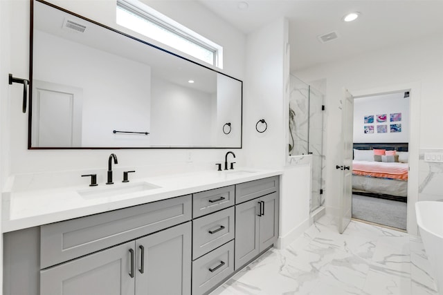 1503 Chestnut St Unit B, Houston, TX 77009 - bathroom featuring a marble finish shower, double vanity, marble look tiles, recessed lighting, and ensuite bath