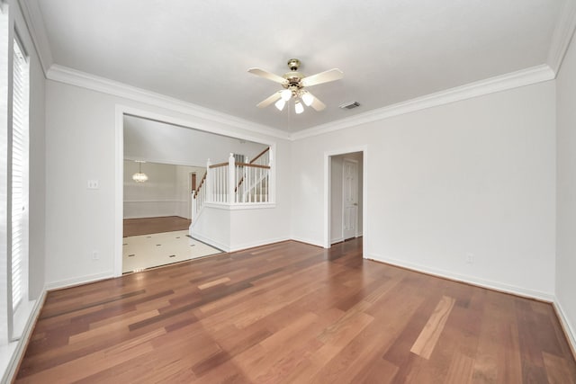 4311 Roaring Rapids Dr, Pasadena, TX 77059 - unfurnished room with ceiling fan, wood finished floors, ornamental molding, and baseboards