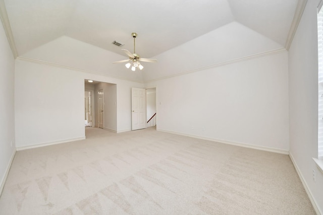 4311 Roaring Rapids Dr, Pasadena, TX 77059 - spare room featuring light colored carpet, a ceiling fan, vaulted ceiling, baseboards, and crown molding