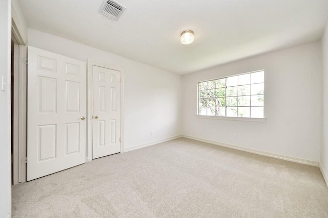 4311 Roaring Rapids Dr, Pasadena, TX 77059 - unfurnished bedroom featuring carpet floors and baseboards