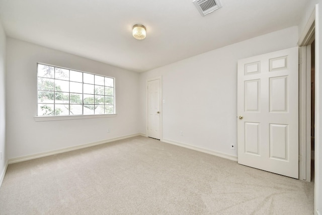 4311 Roaring Rapids Dr, Pasadena, TX 77059 - unfurnished room with light colored carpet and baseboards
