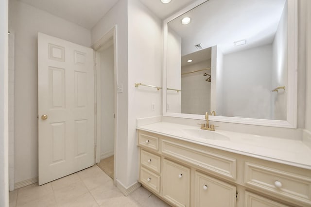 4311 Roaring Rapids Dr, Pasadena, TX 77059 - full bathroom featuring vanity, baseboards, tile patterned floors, recessed lighting, and a shower