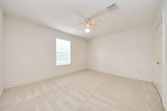 4311 Roaring Rapids Dr, Pasadena, TX 77059 - spare room with light colored carpet, ceiling fan, and baseboards