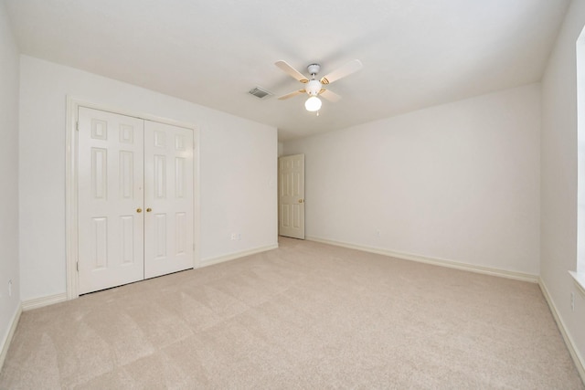 4311 Roaring Rapids Dr, Pasadena, TX 77059 - unfurnished bedroom featuring light carpet, a closet, and baseboards