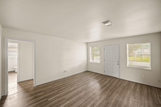 231 Gruss Dr, Houston, TX 77060 - entryway with wood finished floors, healthy amount of natural light, and baseboards