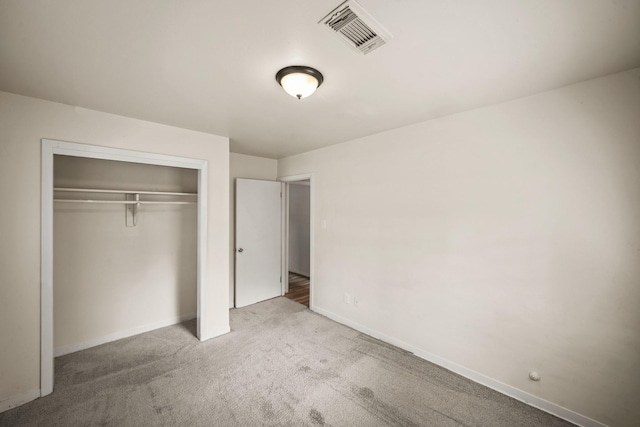 231 Gruss Dr, Houston, TX 77060 - unfurnished bedroom featuring carpet flooring, a closet, and baseboards