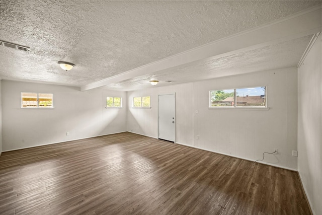 231 Gruss Dr, Houston, TX 77060 - unfurnished room with a textured ceiling, wood finished floors, plenty of natural light, and baseboards