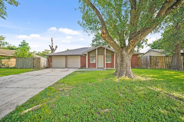 231 Gruss Dr, Houston, TX 77060 - single story home with an attached garage, brick siding, and concrete driveway