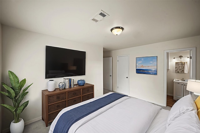 231 Gruss Dr, Houston, TX 77060 - bedroom featuring baseboards and ensuite bath