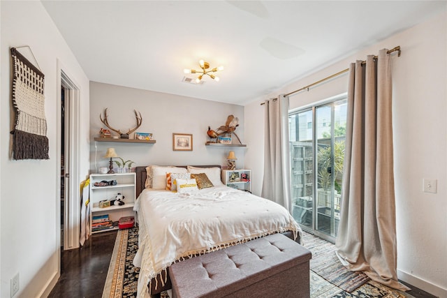 429 Meadow St, Houston, TX 77020 - bedroom featuring wood finished floors, access to outside, and baseboards