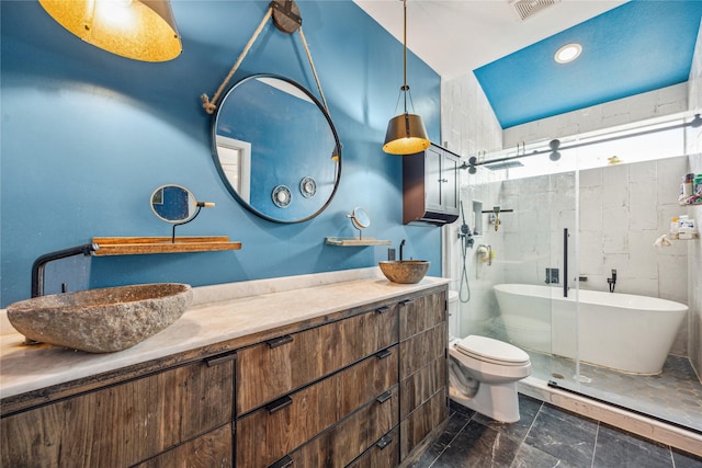 429 Meadow St, Houston, TX 77020 - bathroom with a stall shower, vanity, toilet, and a freestanding tub