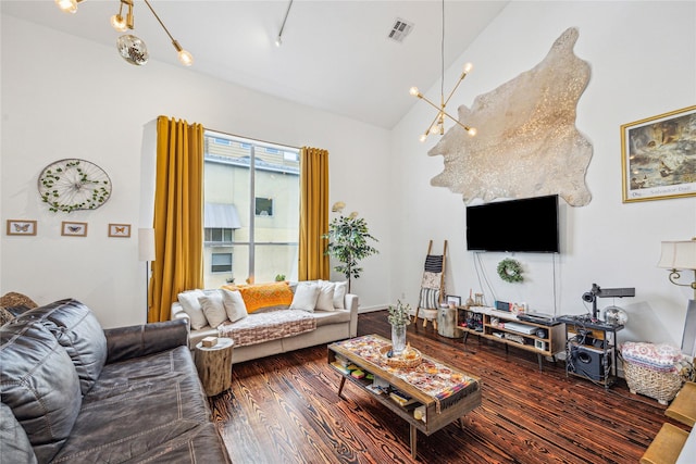 429 Meadow St, Houston, TX 77020 - living room with a chandelier, wood finished floors, and lofted ceiling