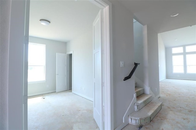 2296 Vargas St, Magnolia, TX 77316 - stairs featuring plenty of natural light and concrete floors