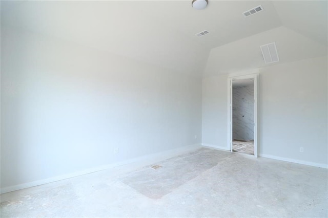 2296 Vargas St, Magnolia, TX 77316 - empty room featuring vaulted ceiling and baseboards