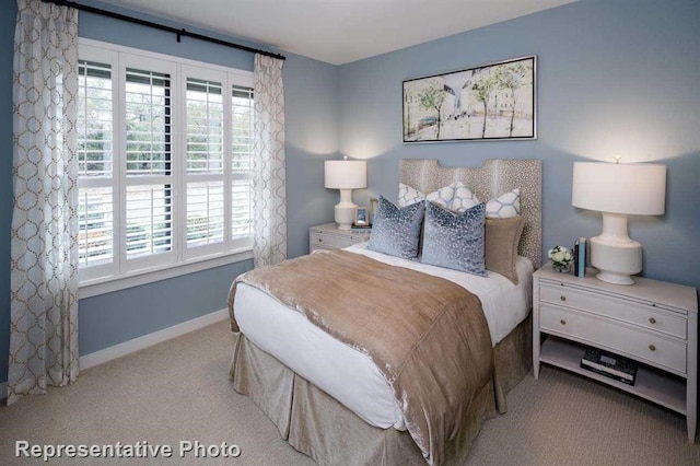 2296 Vargas St, Magnolia, TX 77316 - bedroom featuring multiple windows, carpet flooring, and baseboards