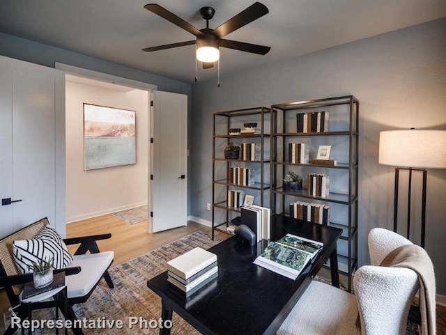 2296 Vargas St, Magnolia, TX 77316 - office space with a ceiling fan, wood finished floors, and baseboards