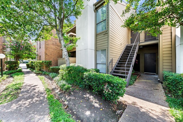 10053 Westpark Dr Unit 332, Houston, TX 77042 - view of property featuring stairs
