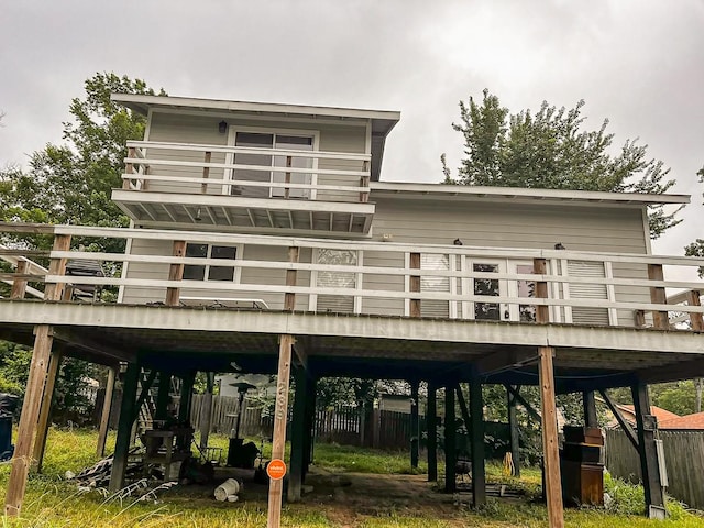 239 Cove Vw, Trinity, TX 75862 - back of house featuring a wooden deck and stairs