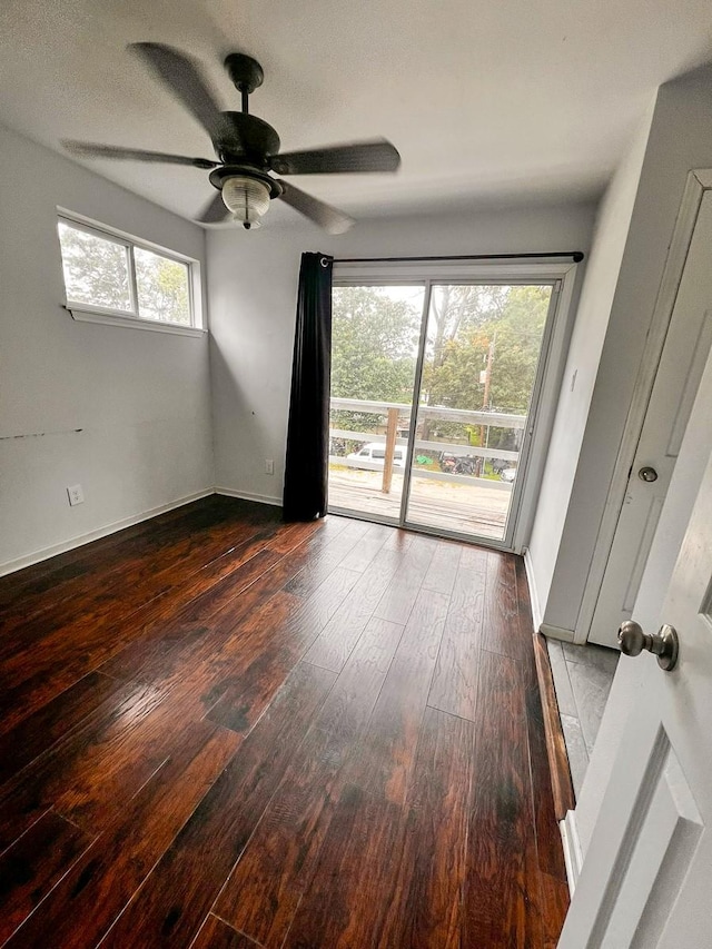 239 Cove Vw, Trinity, TX 75862 - empty room featuring hardwood / wood-style floors, a ceiling fan, and baseboards