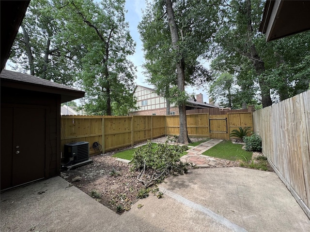 3823 Knollcrest Dr, Montgomery, TX 77356 - fenced backyard featuring cooling unit, a gate, and a patio area