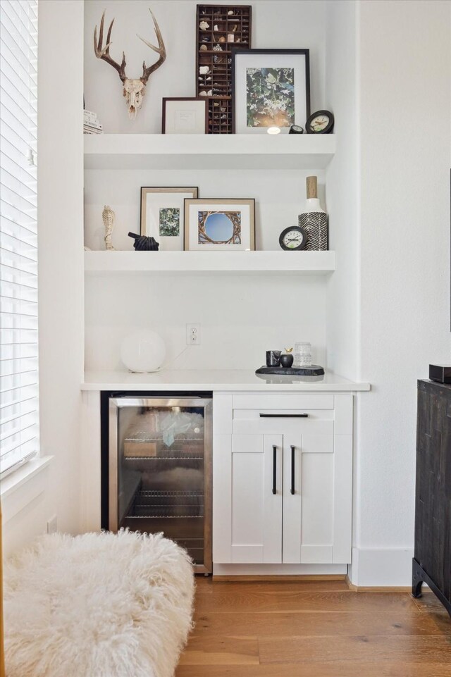 1402 Missouri Unit B, Houston, TX 77006 - indoor dry bar with wine cooler and light wood-style floors