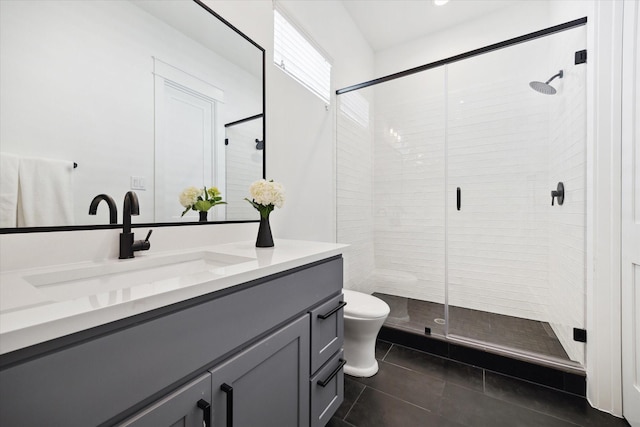1402 Missouri Unit B, Houston, TX 77006 - full bathroom featuring vanity, a stall shower, tile patterned floors, and toilet