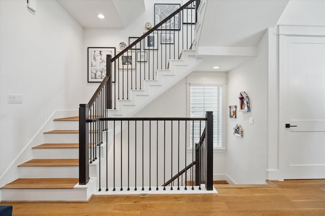 1402 Missouri Unit B, Houston, TX 77006 - staircase featuring wood finished floors, baseboards, and recessed lighting