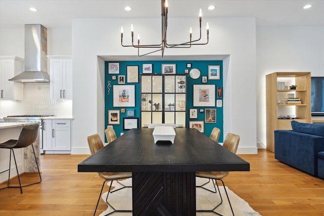 1402 Missouri Unit B, Houston, TX 77006 - dining space with a chandelier, light wood finished floors, and recessed lighting