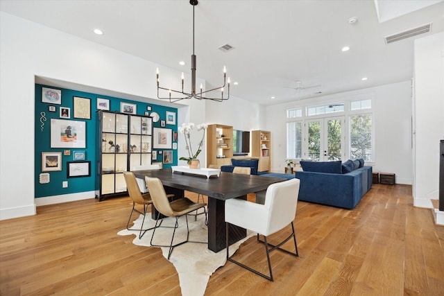 1402 Missouri Unit B, Houston, TX 77006 - dining space with a chandelier, light wood-style flooring, recessed lighting, baseboards, and ceiling fan