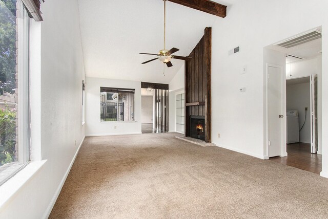 11625 Lakeside Park Dr, Houston, TX 77077 - unfurnished living room featuring carpet floors, high vaulted ceiling, a ceiling fan, a large fireplace, and beam ceiling
