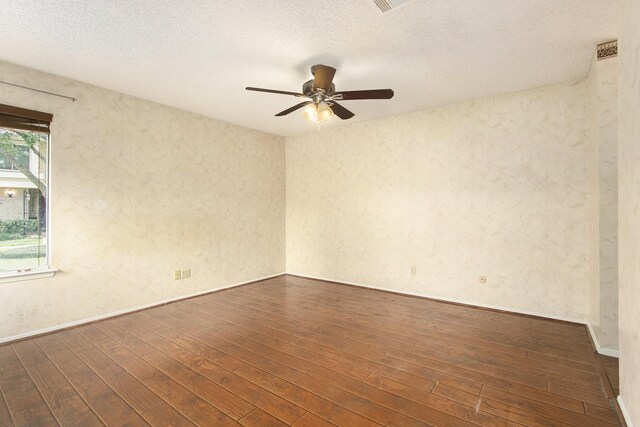 11625 Lakeside Park Dr, Houston, TX 77077 - unfurnished room with ceiling fan, dark wood finished floors, a textured ceiling, and a textured wall