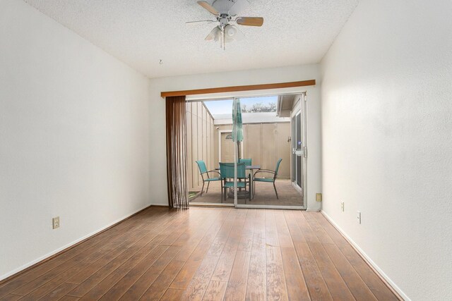 11625 Lakeside Park Dr, Houston, TX 77077 - unfurnished room with ceiling fan, wood finished floors, and a textured ceiling
