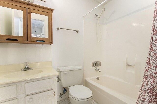 11625 Lakeside Park Dr, Houston, TX 77077 - bathroom featuring shower / bathtub combination with curtain, vanity, and tile patterned floors