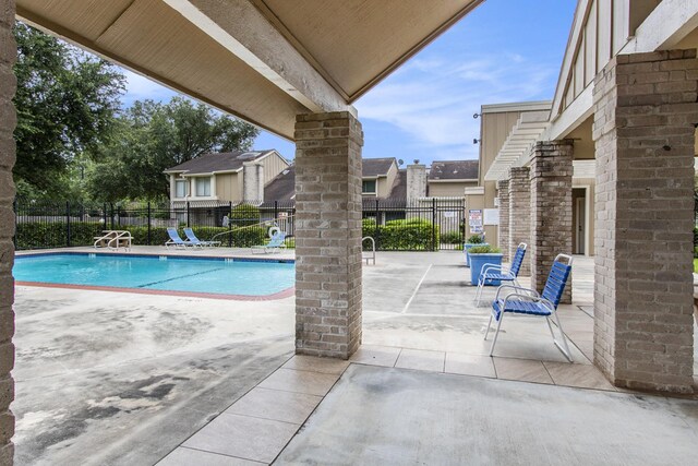 11625 Lakeside Park Dr, Houston, TX 77077 - community pool with a patio area
