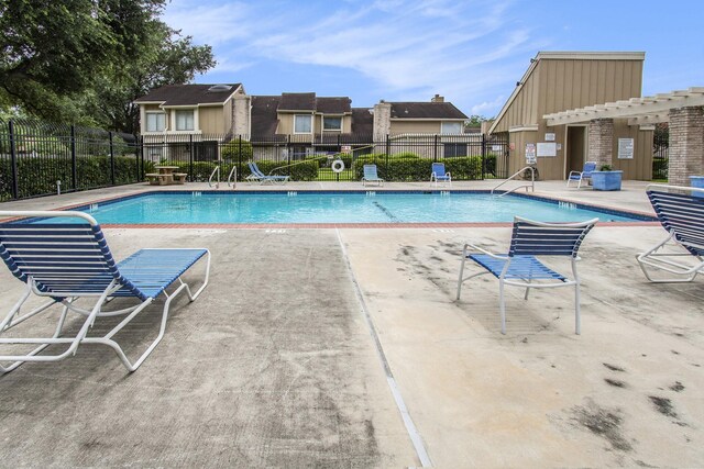 11625 Lakeside Park Dr, Houston, TX 77077 - community pool featuring a patio