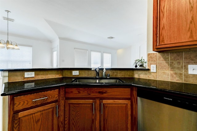 316 Magnolia Way, League City, TX 77573 - kitchen featuring dishwasher, a sink, dark stone countertops, decorative backsplash, and decorative light fixtures