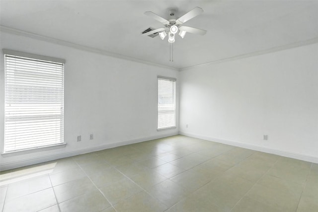 316 Magnolia Way, League City, TX 77573 - spare room with crown molding, ceiling fan, tile patterned flooring, and baseboards