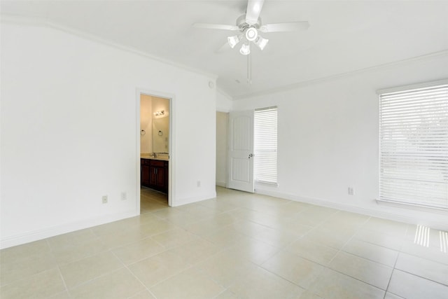 316 Magnolia Way, League City, TX 77573 - unfurnished room with a ceiling fan, ornamental molding, baseboards, and light tile patterned floors