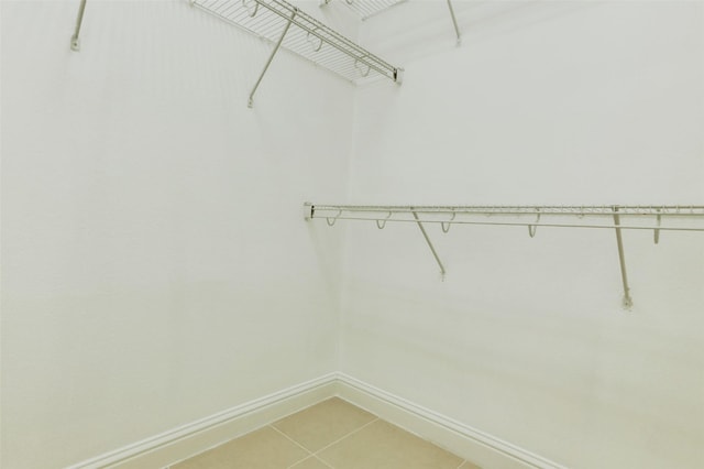 316 Magnolia Way, League City, TX 77573 - walk in closet with light tile patterned flooring