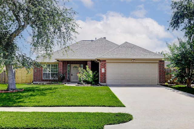316 Magnolia Way, League City, TX 77573 - view of front of home featuring an attached garage, driveway, brick siding, and roof with shingles