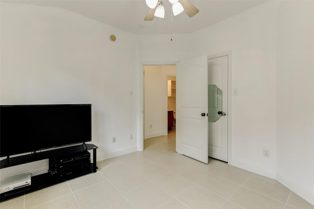 316 Magnolia Way, League City, TX 77573 - bedroom featuring light tile patterned floors, baseboards, and a ceiling fan