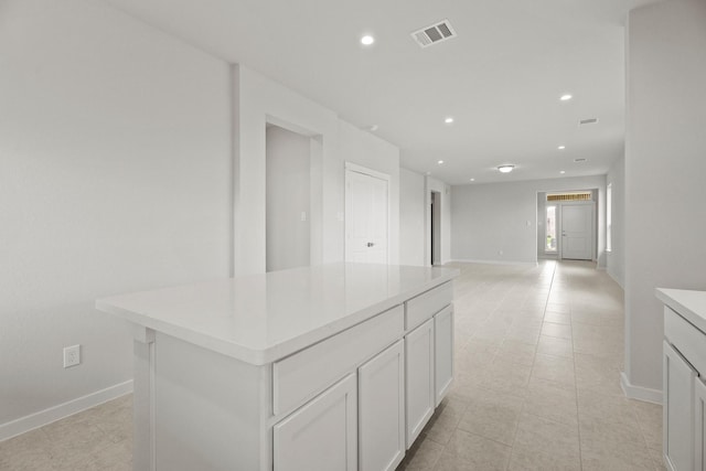 13122 Leisure Cove Dr, Texas City, TX 77568 - hall with recessed lighting, light tile patterned floors, and baseboards