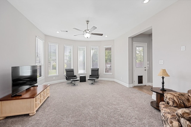 13630 E Palomino Lake Cir, Cypress, TX 77429 - carpeted living room with healthy amount of natural light, a ceiling fan, recessed lighting, and a fireplace