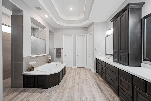 13630 E Palomino Lake Cir, Cypress, TX 77429 - full bath with a bath, vanity, walk in shower, wood finished floors, and recessed lighting