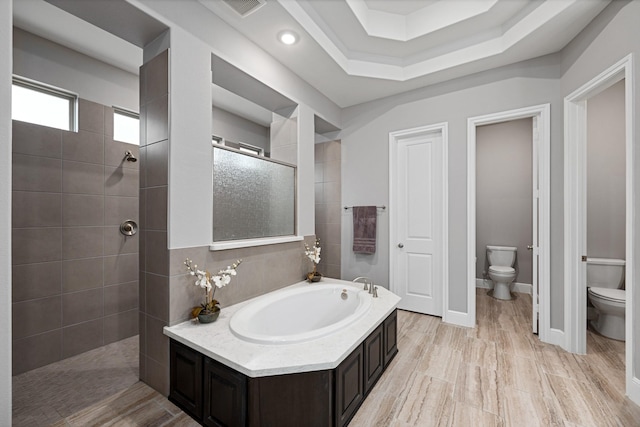 13630 E Palomino Lake Cir, Cypress, TX 77429 - bathroom featuring toilet, a bath, walk in shower, and baseboards