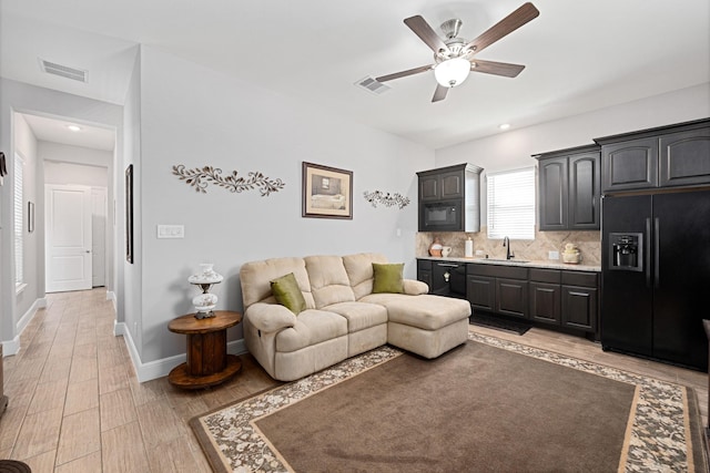 13630 E Palomino Lake Cir, Cypress, TX 77429 - living area featuring ceiling fan, baseboards, light wood-type flooring, and recessed lighting