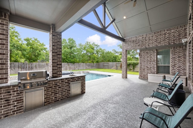 13630 E Palomino Lake Cir, Cypress, TX 77429 - fenced backyard featuring a sink and a patio area