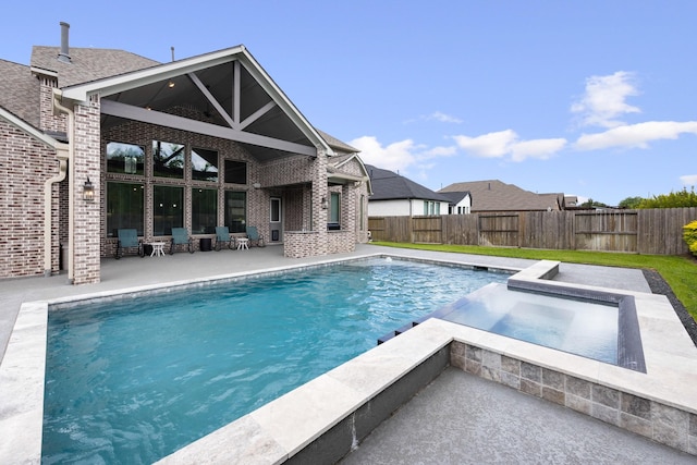 13630 E Palomino Lake Cir, Cypress, TX 77429 - view of pool with a fenced backyard, a patio area, and an in-ground hot tub