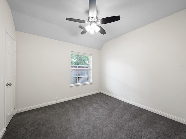 24602 Windemere Park Ct, Katy, TX 77494 - empty room featuring vaulted ceiling, ceiling fan, dark colored carpet, and baseboards
