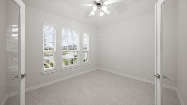 2405 Village Azalea Dr, Texas City, TX 77568 - unfurnished room featuring a ceiling fan and baseboards